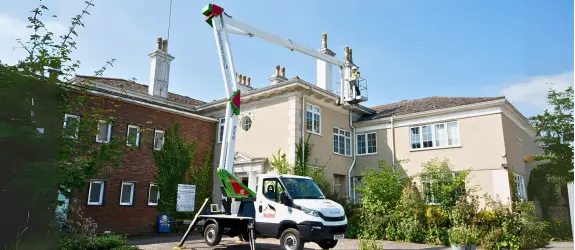 using our cherry picker on a commercial gutter cleaning job in Filwood, St Helens