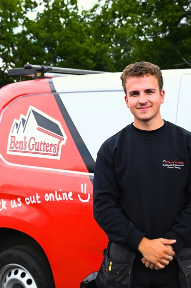 our gutter cleaner in St Helens standing by company vehicle